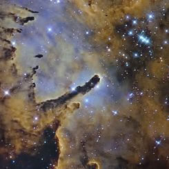  NGC 6823: Cloud Sculpting Star Cluster 