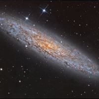  NGC 253: Dusty Island Universe 