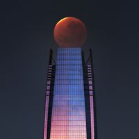  Lunar Eclipse over a Skyscraper 