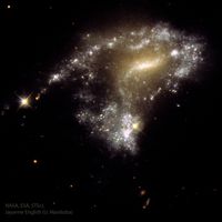  AM1054: Stars Form as Galaxies Collide 