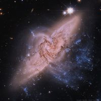  NGC 3314: When Galaxies Overlap 